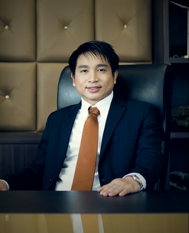 Portrait of the President of AIDC at his desk